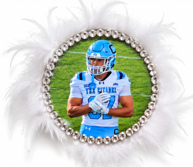 All Dolled Up personalized football photo button with a clear rhinestone border and white feathers arranged behind the button.

