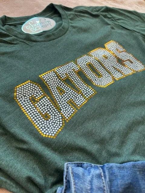 Gators Spangle Varsity Letter Tee in heather green – front view with bold varsity spangle GATORS bling print