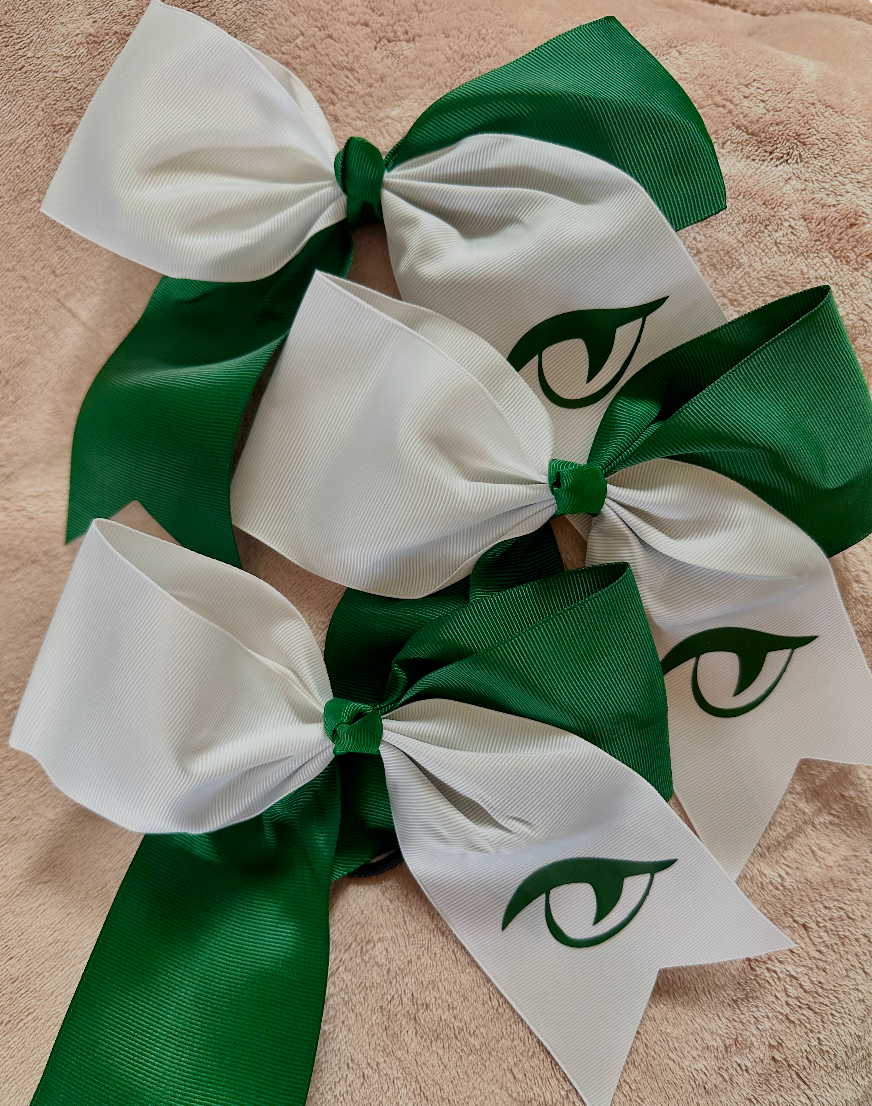 Multiple River Bluff forest green and white grosgrain Gator Eye cheer bows displayed together