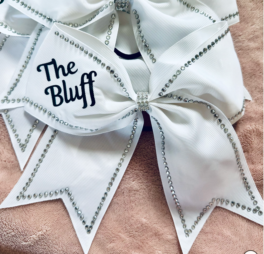 River Bluff white rhinestone cheer bows showing The Bluff lettering – spirit wear by Southern Script