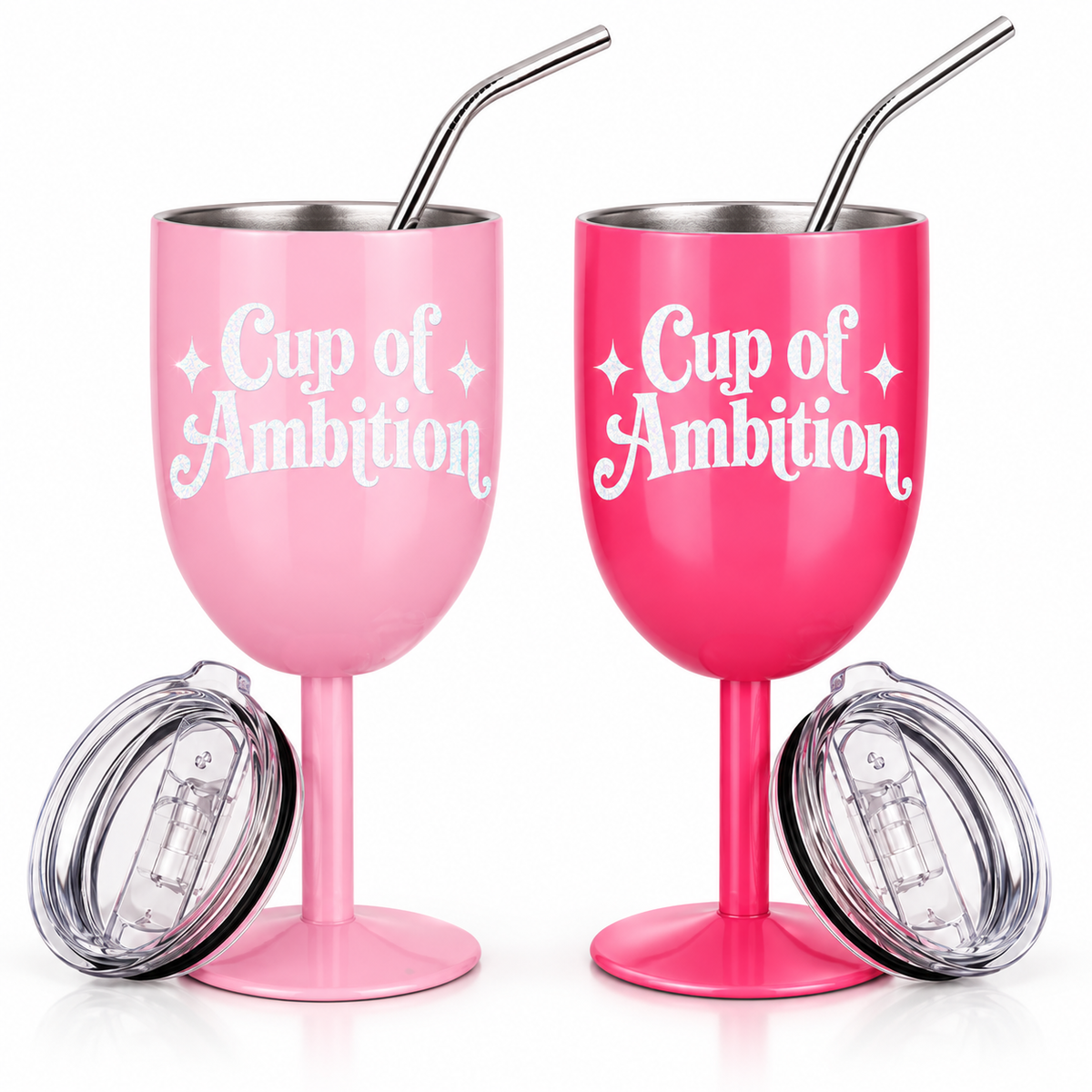 Two stainless steel stemless wine cups with metal straws, one in light pink and one in bright pink, both printed with the phrase 'Cup of Ambition' in white. Two clear lids are shown beside the cups on a white background.