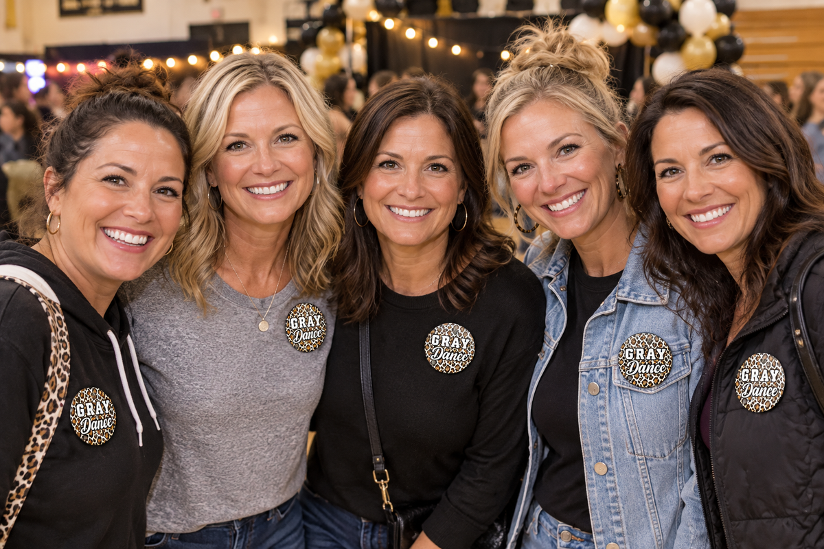 Several moms wearing Gray Dance leopard buttons